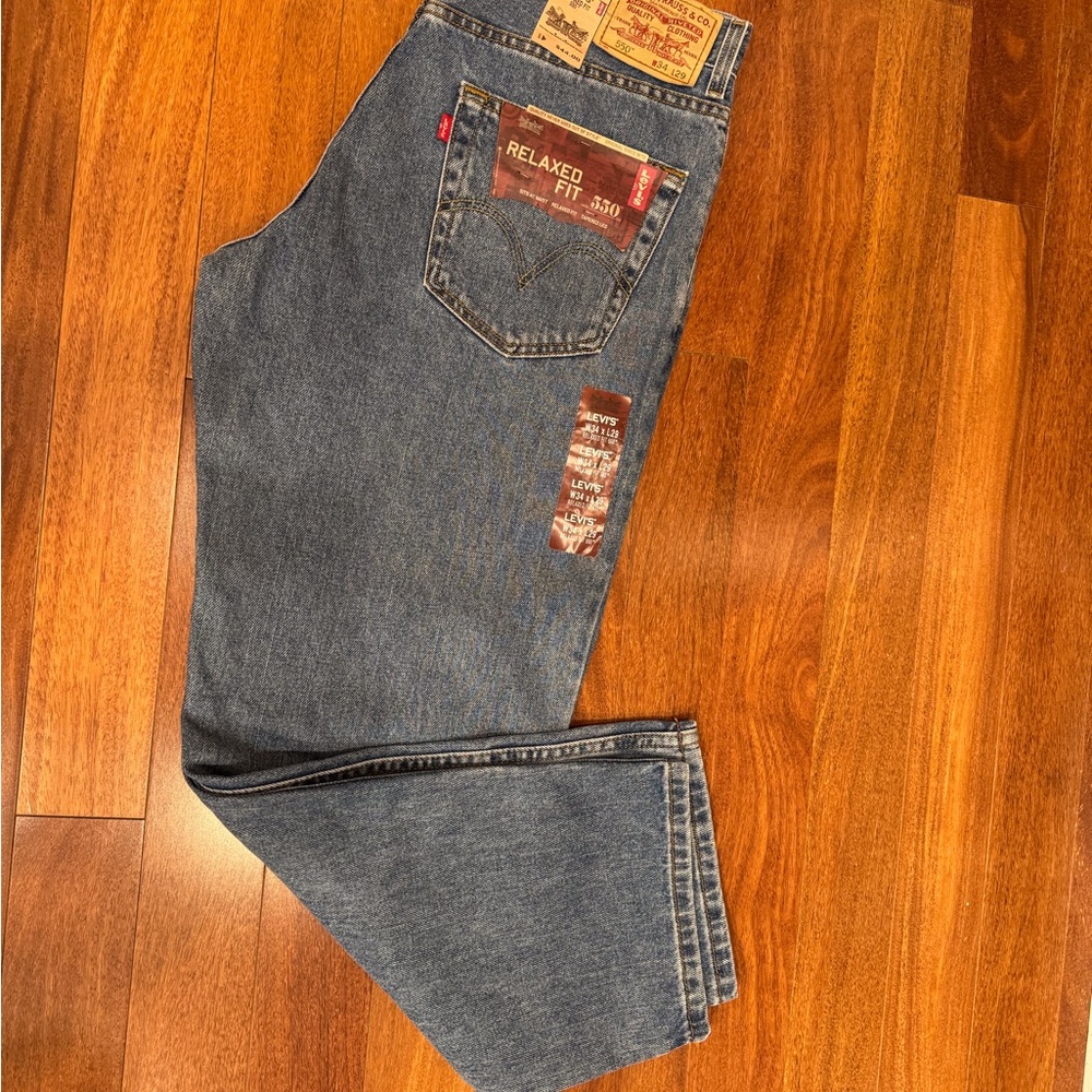 Levi's Relaxed Blue Jeans with Distressed Detailing